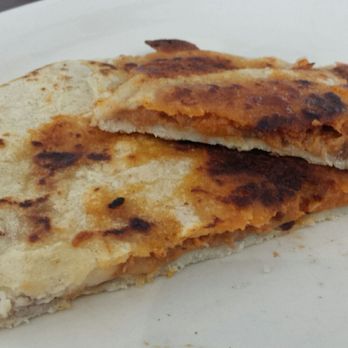 El Papaturro Restaurant - Pupusa showing what it's made of. - Salvadoran Near Me - Albuquerque, New Mexico El Papaturro Restaurant - Pupusa showing what it's made of. - Salvadoran Near Me - Albuquerque, New Mexico