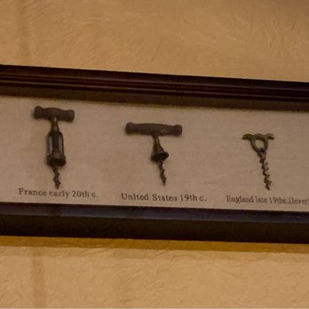 Giovanni's - different types of wine openers displayed in a shadow box - Italian Near Me - Beaverton, Oregon Giovanni's - different types of wine openers displayed in a shadow box - Italian Near Me - Beaverton, Oregon