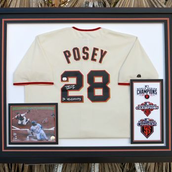 Four Sticks Picture Framing - A signed photo and three patches, framed with mats which have beveled outside edges, mounted atop a jersey. - Framing Near Me - Torrance, California Four Sticks Picture Framing - A signed photo and three patches, framed with mats which have beveled outside edges, mounted atop a jersey. - Framing Near Me - Torrance, California