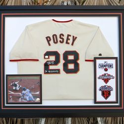 Four Sticks Picture Framing - A signed photo and three patches, framed with mats which have beveled outside edges, mounted atop a jersey.