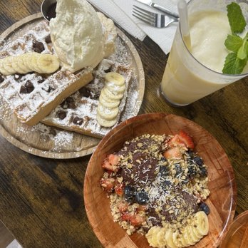 Waffle and Berry - drink: mango lava flow waffle: chocolate chip banana with Acai Bowl - Waffles Near Me - Honolulu, Hawaii