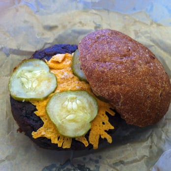 Evolution Fast Food - Black Bean Burger with cheese and pickles - Yum! - Vegetarian Near Me - San Diego, California Evolution Fast Food - Black Bean Burger with cheese and pickles - Yum! - Vegetarian Near Me - San Diego, California