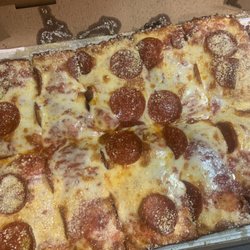 Jet's Pizza - Large cheese and pepperoni pizza.