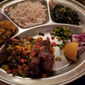 Annapurna Cafe - Sekuwa daily special - goat and fresh citrus and chilies with various sides take you across Nepal! - Indian Near Me - Seattle, Washington