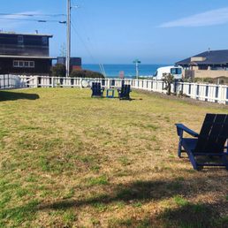 Yard with relaxing seating to watch the sunset. Yard with relaxing seating to watch the sunset.