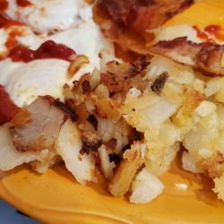 Sunrise Diner - 2 fried eggs sunny side up and home fries kids size.