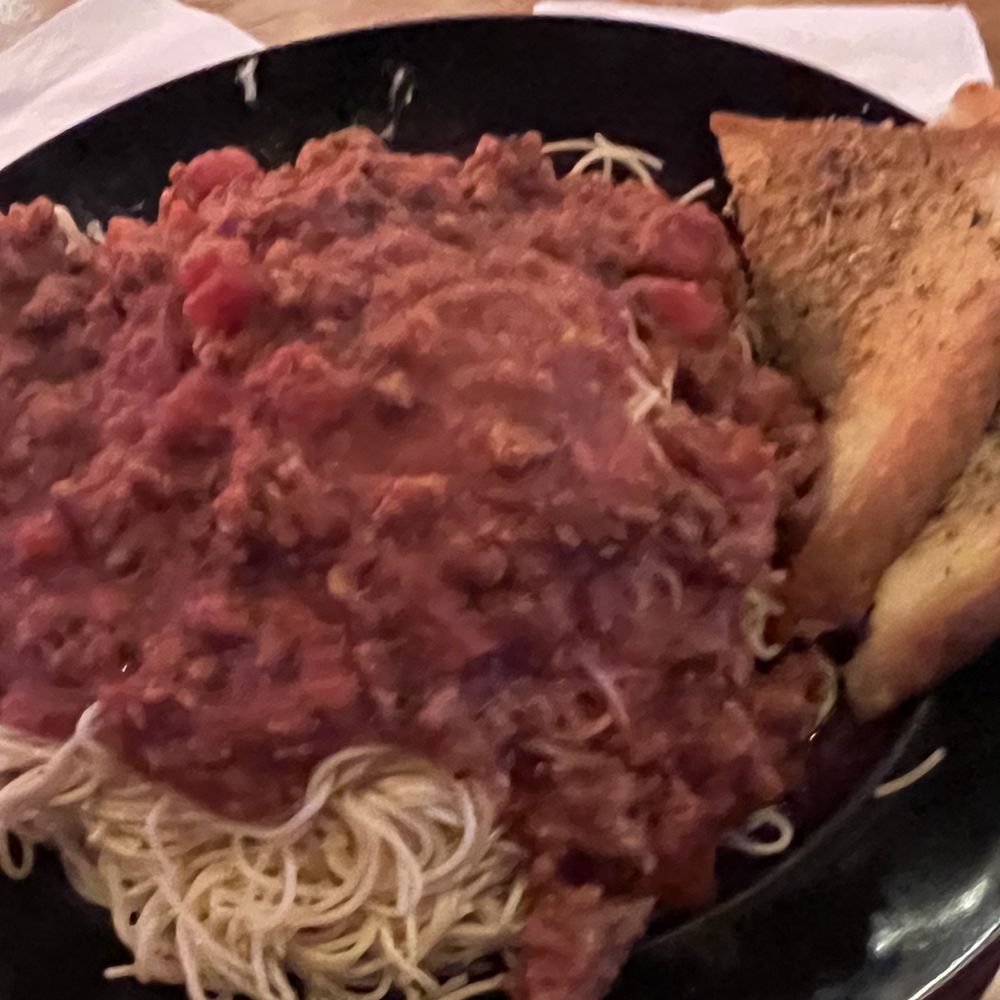 Wildhorse Bar & Grill - Giant plate of spaghetti with garlic toast - Bars Near Me - Molalla, Oregon Wildhorse Bar & Grill - Giant plate of spaghetti with garlic toast - Bars Near Me - Molalla, Oregon
