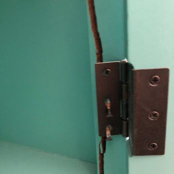 Colonial Van Lines - Mirrored cabinet.  Somehow frame was bent/cracked in cabinet door. - Movers Near Me - Pompano Beach, Florida