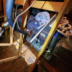 Roy's AC Heat and Appliance Repair - Can't service my system because Roy's installed it BACKWARDS, with the panels against a truss.