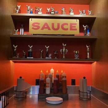 Penny Red's - a display of sauces and condiments - Chicken Shop Near Me - Detroit, Michigan Penny Red's - a display of sauces and condiments - Chicken Shop Near Me - Detroit, Michigan