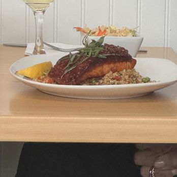Reel Seafood Grill - Neighboring table salmon dish - Seafood Near Me - Greensboro, North Carolina Reel Seafood Grill - Neighboring table salmon dish - Seafood Near Me - Greensboro, North Carolina