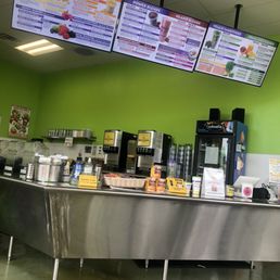 a restaurant counter and menus