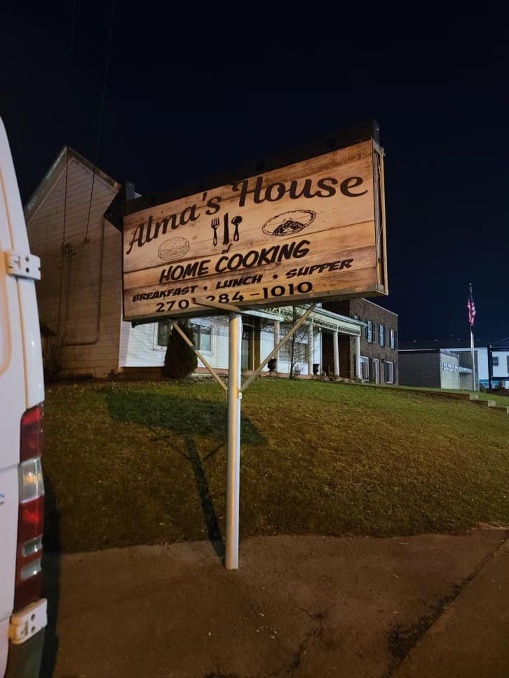 Alma's House of Home Cooking Logo