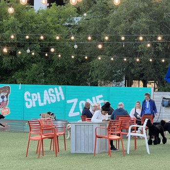 Fetch Park - people sitting at tables with umbrellas - Dog Parks Near Me - Atlanta, Georgia Fetch Park - people sitting at tables with umbrellas - Dog Parks Near Me - Atlanta, Georgia