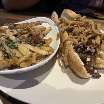 Yard House - House Cheesesteak Sandwich with House Fries. - New American Near Me - Irvine, California Yard House - House Cheesesteak Sandwich with House Fries. - New American Near Me - Irvine, California