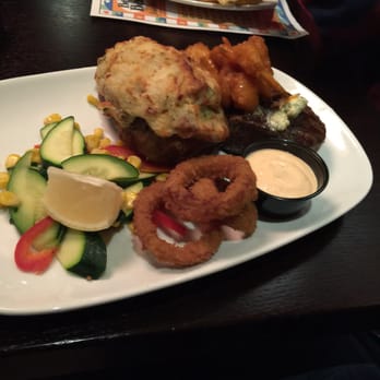 MR MIKES - Steak with shrimp, twice baked potato, onion rings and vegetables - Steakhouses Near Me - Airdrie, Alberta