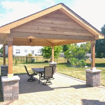 Arrowhead Brick Pavers - a patio with a table and chairs - General Contractors Near Me - Bristol, Illinois