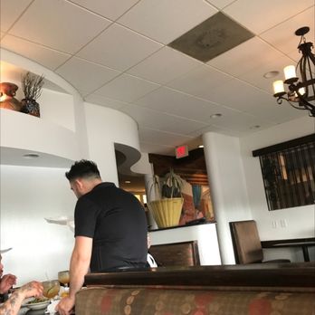 Don Juan's - a man preparing food in a restaurant - Mexican Near Me - Kernersville, North Carolina