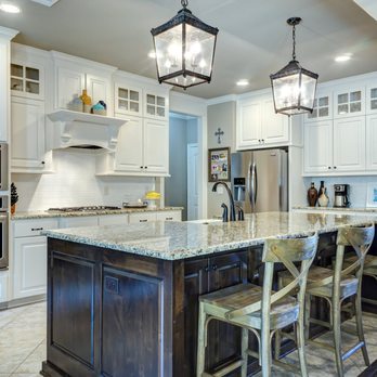 Cook Quality Construction - a large kitchen with a center island - General Contractors Near Me Cook Quality Construction - a large kitchen with a center island - General Contractors Near Me