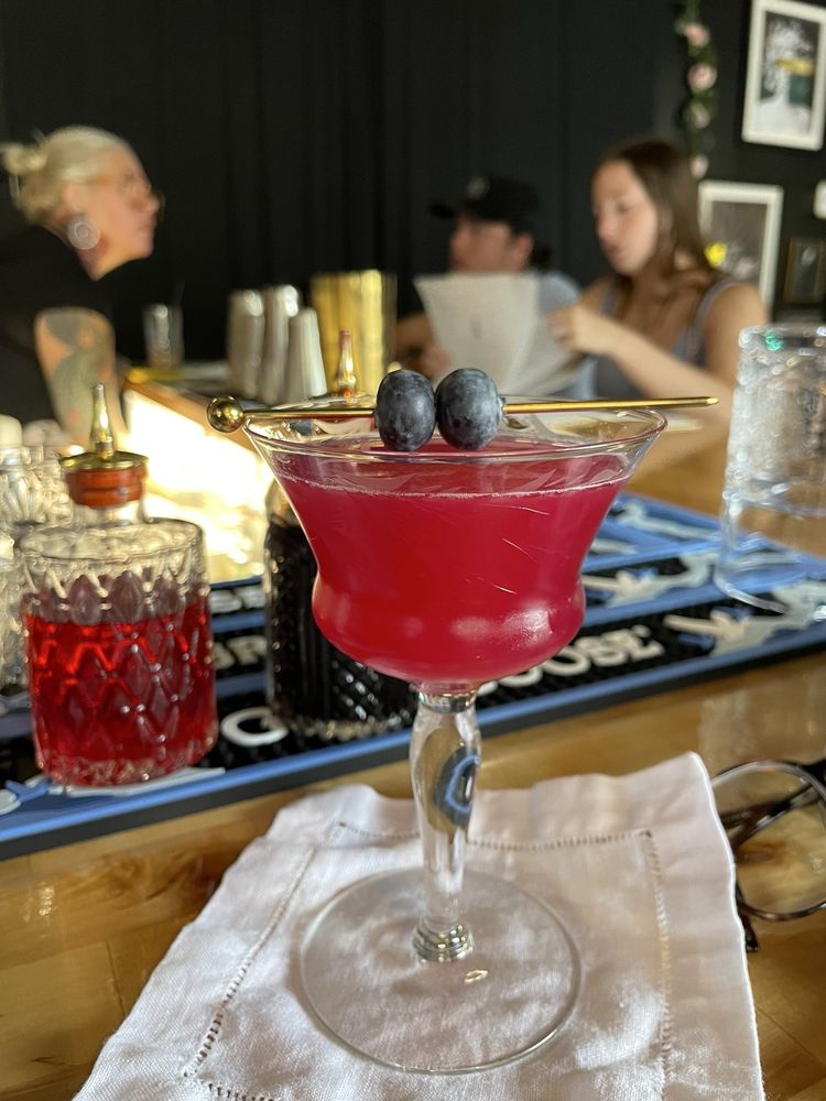 Positively Primeval Cocktail Logo