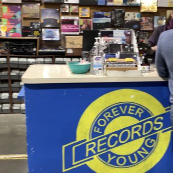 Forever Young Records - Inside at the register. - Music & DVDs Near Me - Grand Prairie, Texas Forever Young Records - Inside at the register. - Music & DVDs Near Me - Grand Prairie, Texas