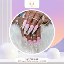 Number 1 Nails - Nails that shine like never before!  Get the perfect design today.  DM us for your appointment!
