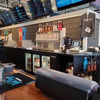 March First Brewing - TVs only one at each end and 3 beer rotation TVs in the middle. Hard to watch 2 TVs. There is a tv at each side. - Breweries Near Me - Cincinnati, Ohio March First Brewing - TVs only one at each end and 3 beer rotation TVs in the middle. Hard to watch 2 TVs. There is a tv at each side. - Breweries Near Me - Cincinnati, Ohio