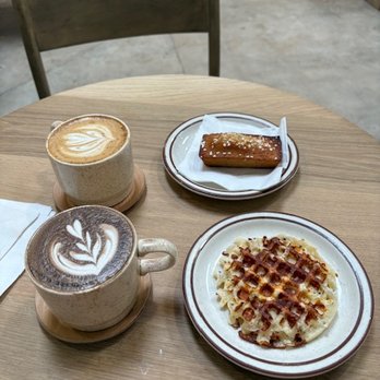 Offbeat Coffee - Top: Siagon Cinnamon coffee and Brown Butter Financier  Bottom: Hojicha Latte and Everything Cheese Waffle - Coffee & Tea Near Me - Sacramento, California