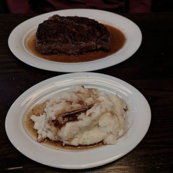 Twisted Tree - Ribeye steak and mashed potatoes with au jus - Seafood Near Me - Saint Louis, Missouri Twisted Tree - Ribeye steak and mashed potatoes with au jus - Seafood Near Me - Saint Louis, Missouri