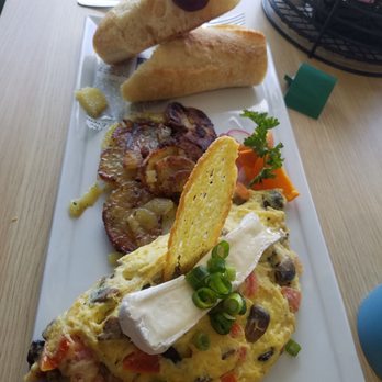 LOVELY SQUARE - The Mountain omelet - Breakfast & Brunch Near Me - Sarasota, Florida LOVELY SQUARE - The Mountain omelet - Breakfast & Brunch Near Me - Sarasota, Florida