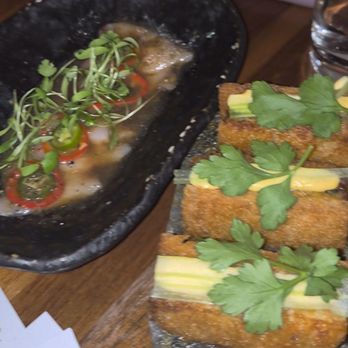 Huntress - Lobster cakes and fish garnishes with Jalapeños and chili - Steakhouses Near Me - San Diego, California Huntress - Lobster cakes and fish garnishes with Jalapeños and chili - Steakhouses Near Me - San Diego, California