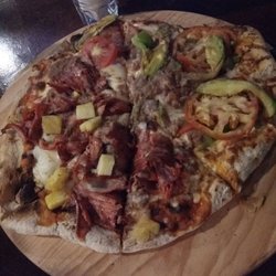 La Frida - Pizza artesanal mitad Xochimilco y mitad Pastorcita
