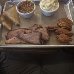 Two meat plate (smoke sausage with jalapeno cheese and brisket along with baked beans and cream of corn. Two meat plate (smoke sausage with jalapeno cheese and brisket along with baked beans and cream of corn.