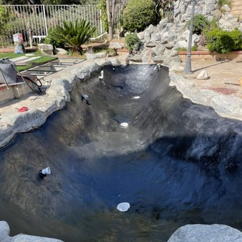 Beach Cities Aquatics - Pond without leak due to added black epoxy. - Aquarium Services Near Me Beach Cities Aquatics - Pond without leak due to added black epoxy. - Aquarium Services Near Me
