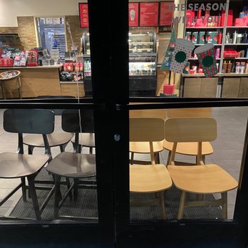Starbucks - a view of a coffee shop through a glass door - Coffee & Tea Near Me - Phoenix, Arizona