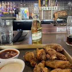 Boone's Trace - Bone in Cajun Dry Rub wings with Ranch and Nashville Hot dipping sauces