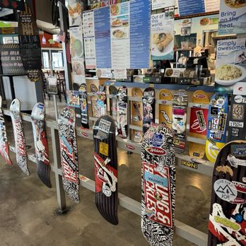 Wahoo's Fish Taco - variety of skateboards on display - Seafood Near Me - Huntington Beach, California Wahoo's Fish Taco - variety of skateboards on display - Seafood Near Me - Huntington Beach, California