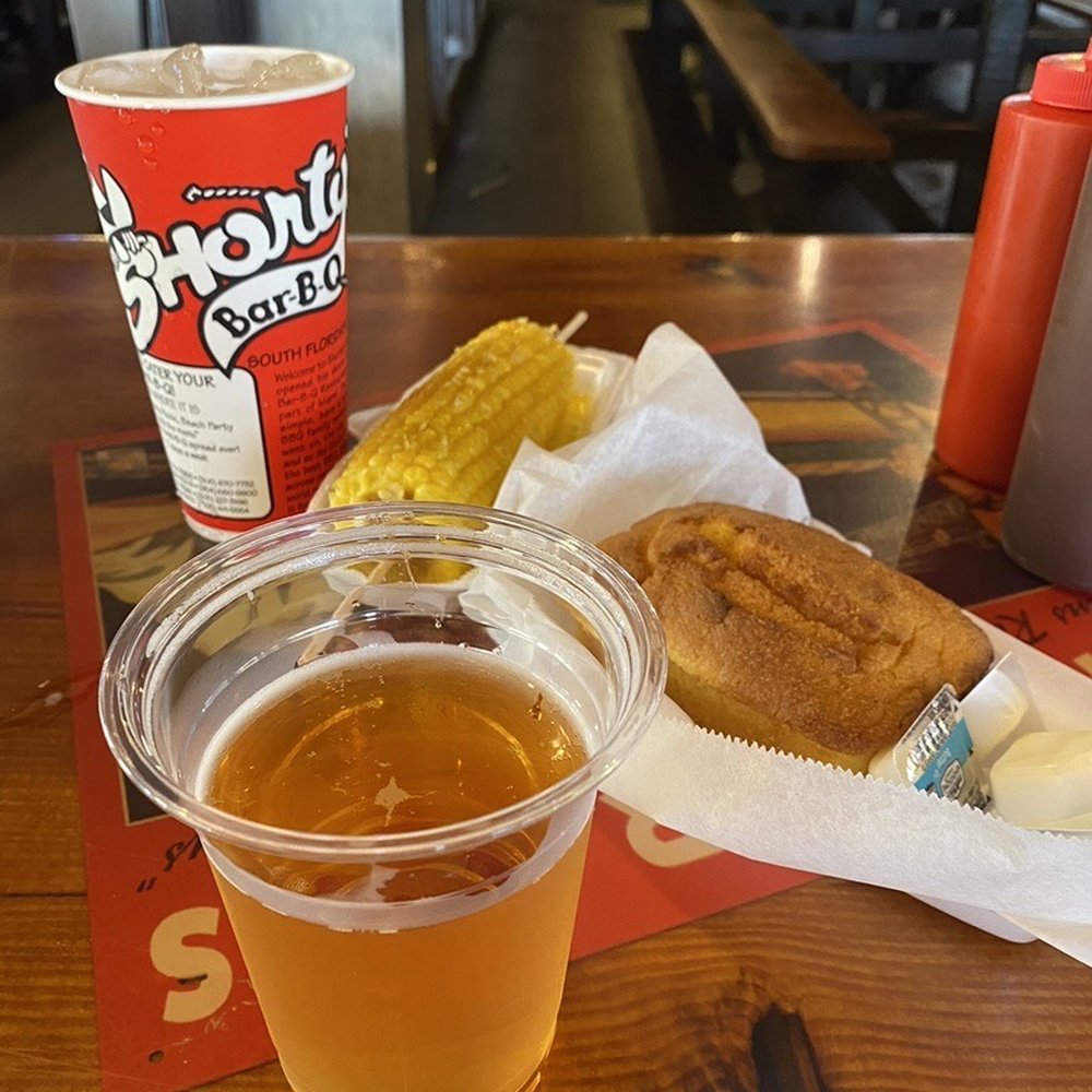 Shorty's BBQ - Cornbread, corn on the cob, draft beer - Southern Near Me - Miami, Florida