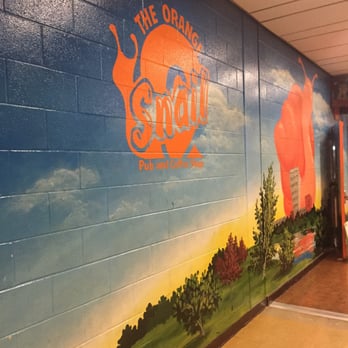 Orange Snail - a mural on the side of a building - Caribbean Near Me - North York, Ontario Orange Snail - a mural on the side of a building - Caribbean Near Me - North York, Ontario