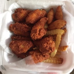 10 piece chicken wings w/ fries & hushpuppies 10 piece chicken wings w/ fries & hushpuppies