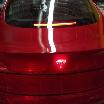 Joe's Stereo - Lit-up "T" (tesla) emblem - Car Stereo Installation Near Me - San Diego, California