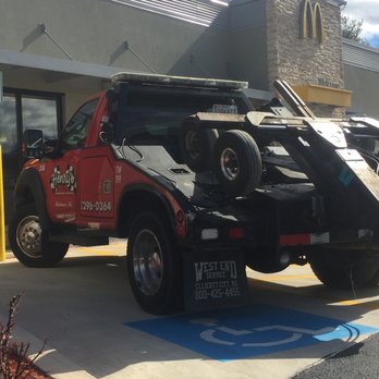 Henry's Wrecker Service - Illegally parked in a handicapped spot, and the driver couldn't even park between the lines. 3/2/2017 in Gaithersburg, MD. - Towing Near Me - Gaithersburg, Maryland Henry's Wrecker Service - Illegally parked in a handicapped spot, and the driver couldn't even park between the lines. 3/2/2017 in Gaithersburg, MD. - Towing Near Me - Gaithersburg, Maryland