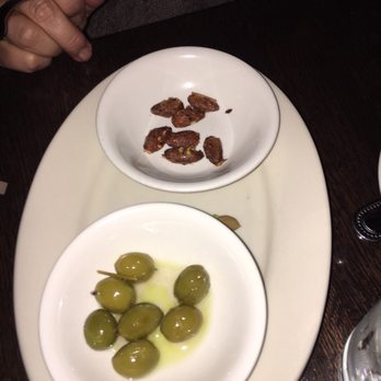 112 Eatery - Half eaten almonds and olives waiting at the table - New American Near Me - Minneapolis, Minnesota