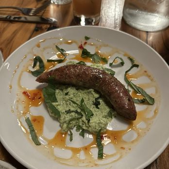 Margot Cafe & Bar - Roasted Local Italian Sausage with Green Garlic Pesto Ricotta & Calabrian Honey - Bars Near Me - Nashville, Tennessee Margot Cafe & Bar - Roasted Local Italian Sausage with Green Garlic Pesto Ricotta & Calabrian Honey - Bars Near Me - Nashville, Tennessee