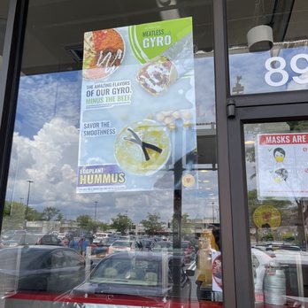 The Halal Guys - a sign in the window - Middle Eastern Near Me - Rockville, Maryland