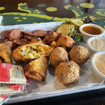 Ragin' Cajun - Alligator Fritters. Fried Boudin Balls. Etouffee & Eggs. Andouille Sausage Poboy. Fried Crawfish Poboy. Lagniappe Salad side. - Cajun/Creole Near Me - Bartlett, Tennessee Ragin' Cajun - Alligator Fritters. Fried Boudin Balls. Etouffee & Eggs. Andouille Sausage Poboy. Fried Crawfish Poboy. Lagniappe Salad side. - Cajun/Creole Near Me - Bartlett, Tennessee