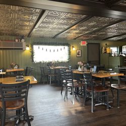 The Gnome bistro - Dining room (love the ceiling tiles and gnome decor)