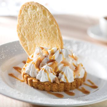 The Capital Grille - Coconut Cream Pie with housemade caramel sauce and a hint of rum. Made fresh daily by our in-house pastry chef. - Seafood Near Me - Fort Worth, Texas The Capital Grille - Coconut Cream Pie with housemade caramel sauce and a hint of rum. Made fresh daily by our in-house pastry chef. - Seafood Near Me - Fort Worth, Texas