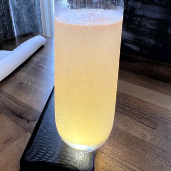 Martini Brunch - Grapefruit mimosa with gold glitter. - Cocktail Bars Near Me - Mount Vernon, Washington Martini Brunch - Grapefruit mimosa with gold glitter. - Cocktail Bars Near Me - Mount Vernon, Washington
