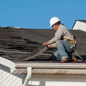 ERC Roofing and Construction - a man working on a roof - Roofing Near Me - Mobile, Alabama ERC Roofing and Construction - a man working on a roof - Roofing Near Me - Mobile, Alabama
